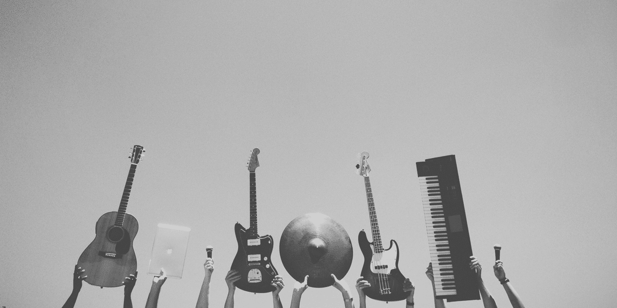 Image commercially licensed from: https://unsplash.com/photos/grayscale-photo-of-people-holding-assorted-music-instruments-pH88tHG-1yw