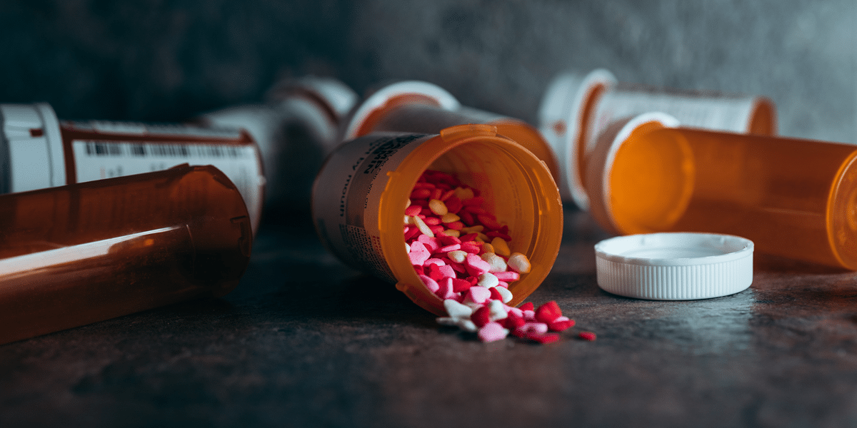 Image commercially licensed from: https://unsplash.com/photos/a-close-up-of-a-bottle-of-pills-on-a-table-l5JPHAYkEmg